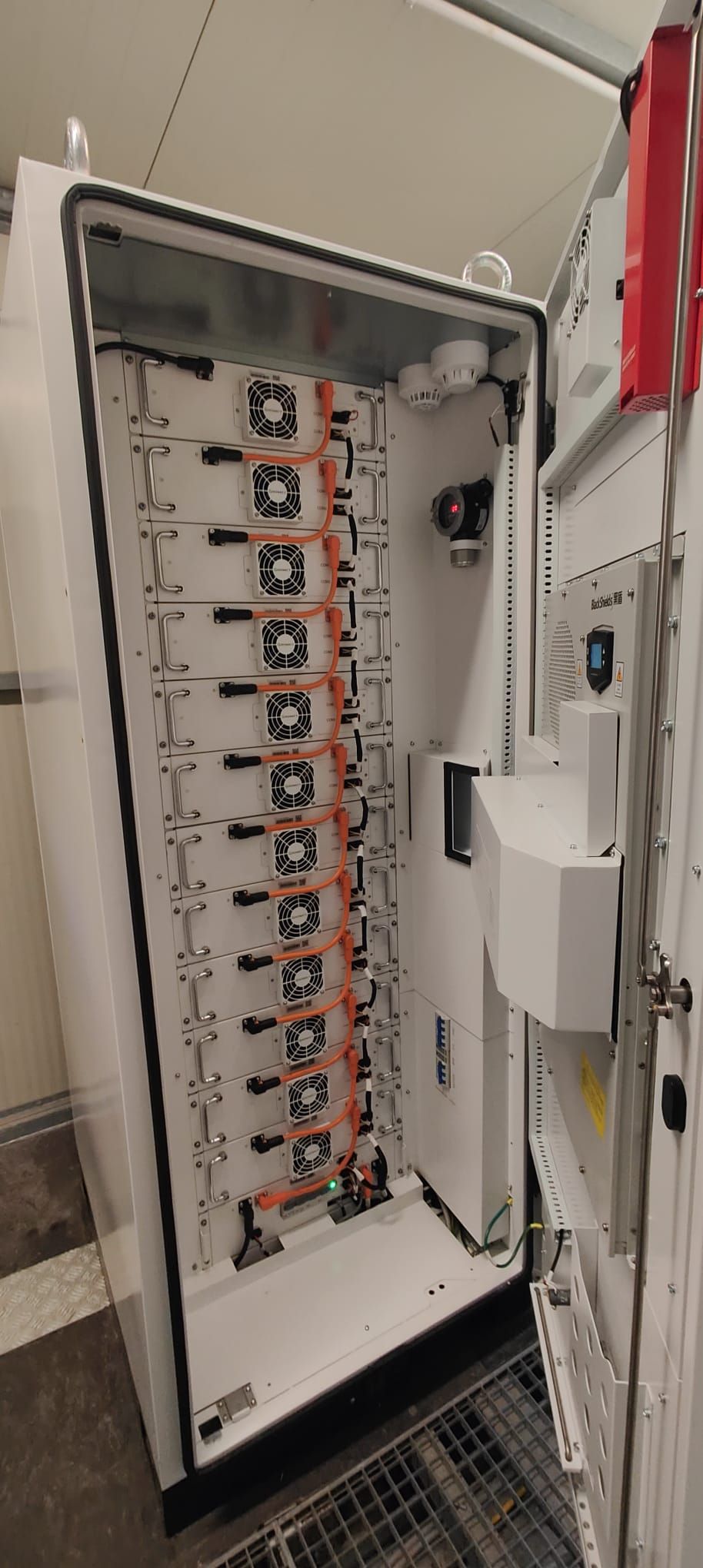 Open Growatt AXE commercial battery cabinet interior for technical reference